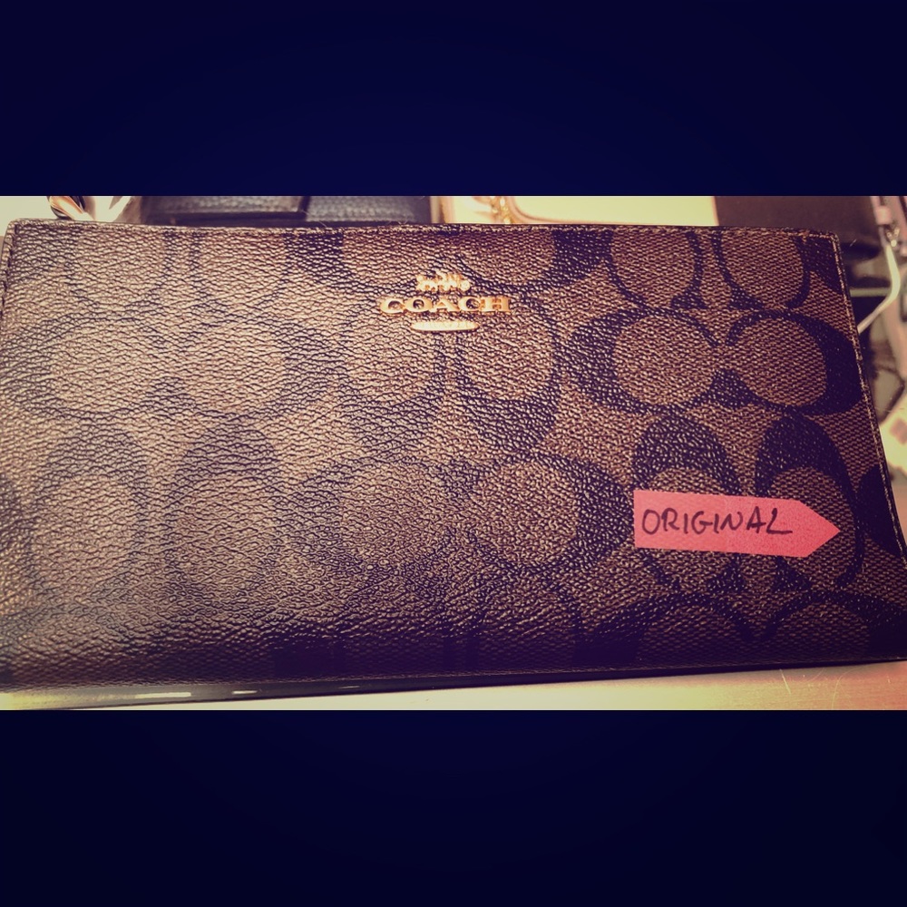 Brown / Black Coach hand purse with strap